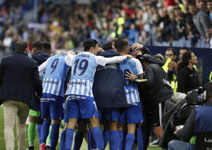 Jugadores del Málaga celebran gol