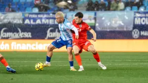 dani lorenzo forcejeo malaga cf burgos la rosaleda jornada 23