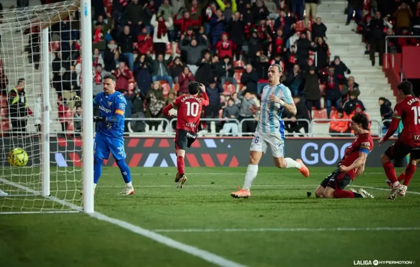 Celebración de Carlos Fernández después de marcar al Málaga CF