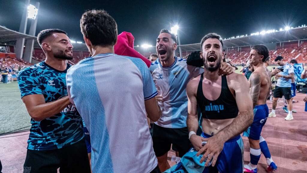 57 - PUGA JUANPE VICTOR CELEBRAN SUBIR A PRIMERA